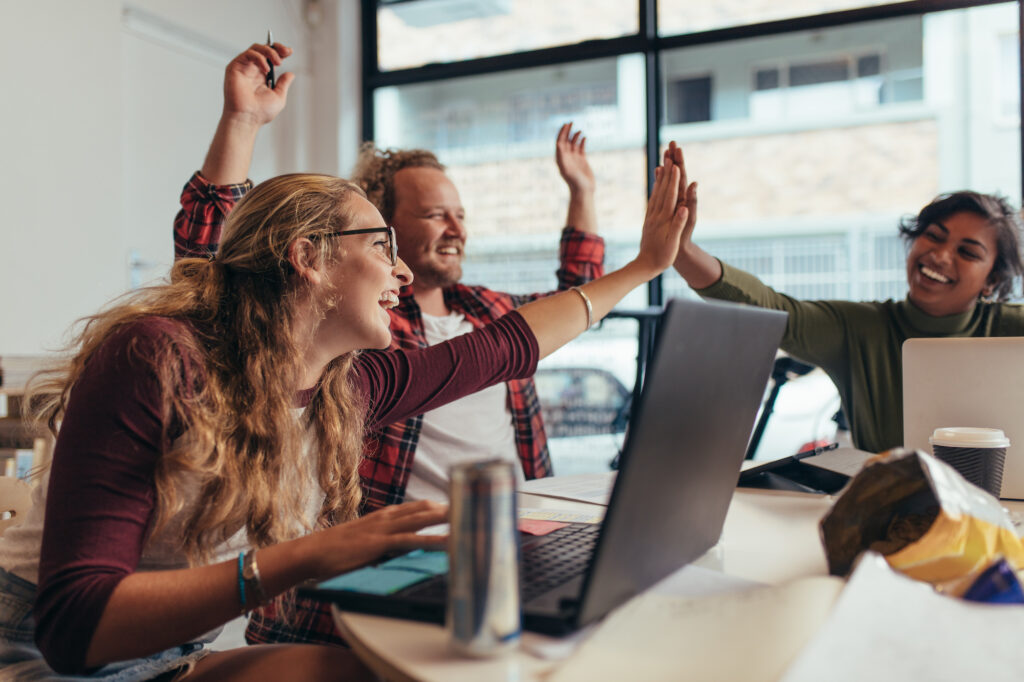 Startup team celebrating success