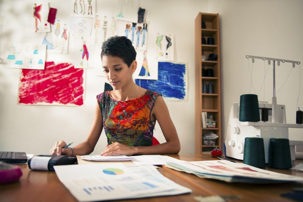 A young business owner checking her finances